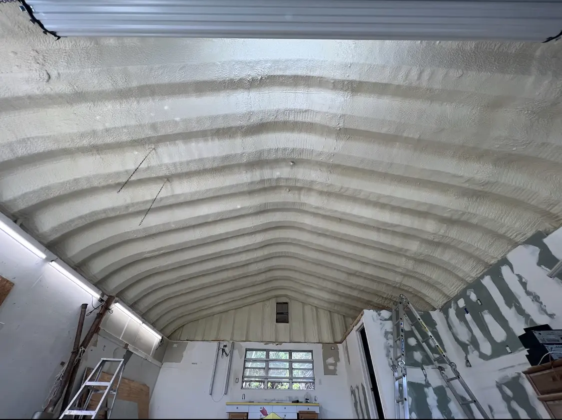 Spray polyurethane foam applied to the underside of a metal roof deck in Charter Oak